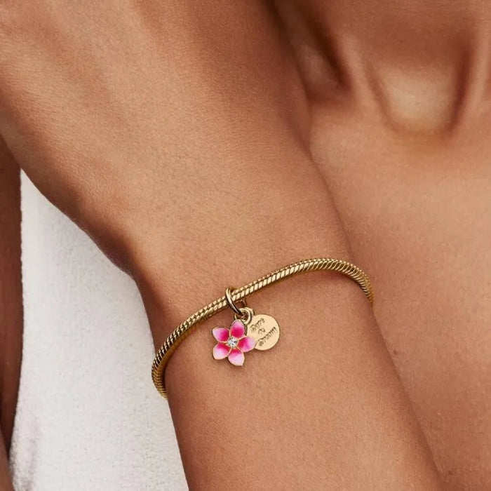 Pandora Disney Moana Flower Dangle Charm in sterling silver and 14k gold plating