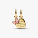 A charming heart-shaped pendant adorned with smooth pink enamel, radiating a cheerful aesthetic.