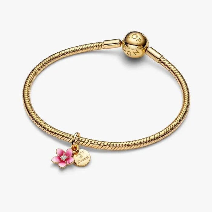 Pandora Disney Moana Flower Dangle Charm in sterling silver and 14k gold plating