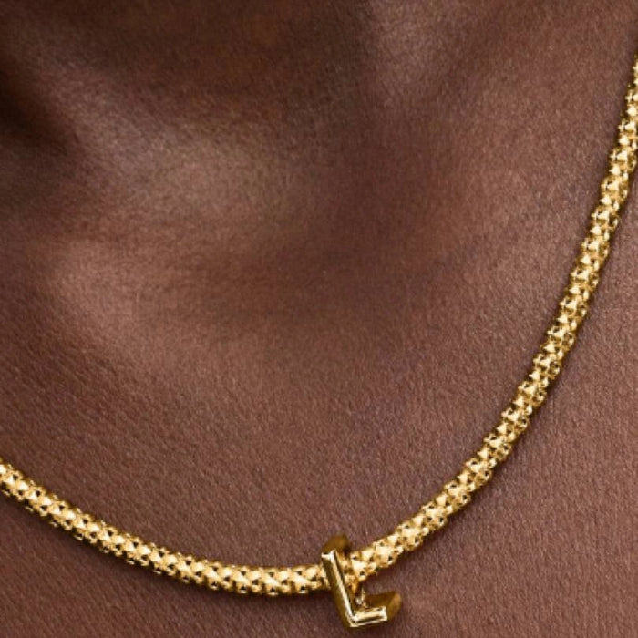 Celebrate what matters most with a customized letter charm, inspiring you to create a unique word or message that reflects your personality and style.