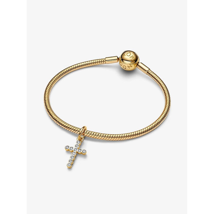The Pandora Cross Dangle Charm in Gold brings a timeless symbol of faith to your bracelet stack.
