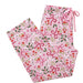 Opportunities Merry Holly & Bows Lounge Pants featuring a festive holiday print with holly leaves and decorative bows.