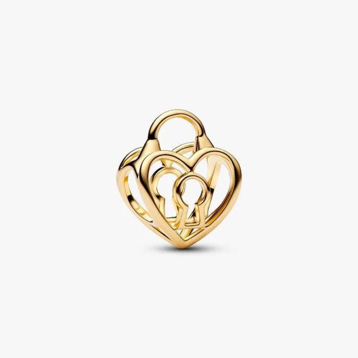Gold heart-shaped key pendant on a white background