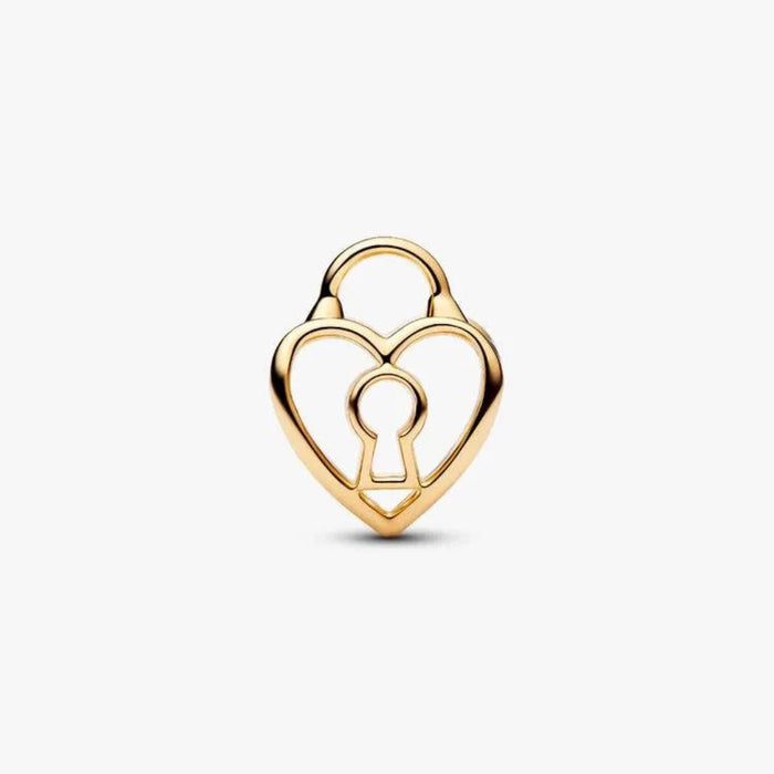 Gold heart-shaped charm with a keyhole cutout on a white background