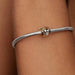 PANDORA Disney Princess Jasmine and Tiger Rajah charm featuring intricate character details and a sparkling synthetic diamond accent for PANDORA Moments jewelry.