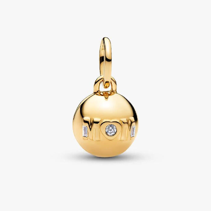 Gold "Mom" charm adorned with sparkling diamonds, showcasing a heartfelt tribute to motherhood.