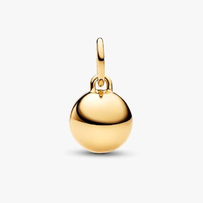 Elegant gold charm spelling "Mom," embellished with diamonds for a luxurious touch.