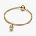 Gold "Mom" charm featuring diamond accents, symbolizing love and appreciation for mothers.
