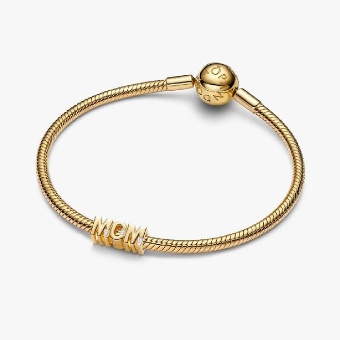 Yellow gold ring with a diamond, finished in rhodium plating, celebrating the bond between mother and child.