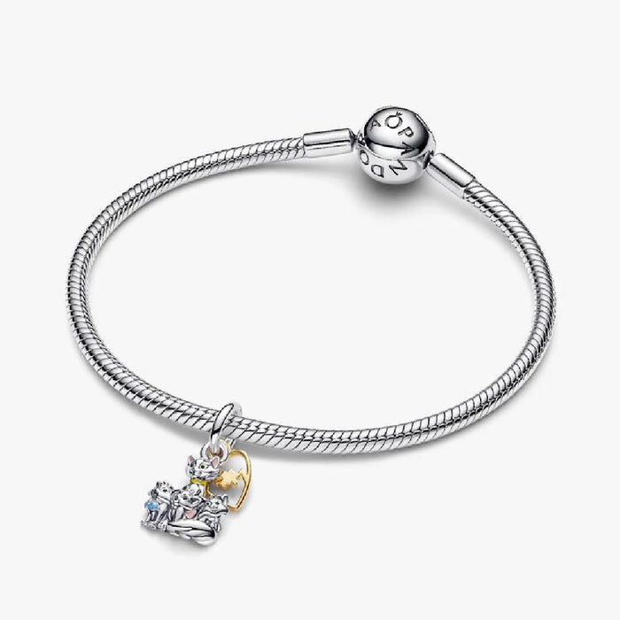 Disney family charm by Pandora, intricately designed with popular characters, celebrating family bonds and magic.