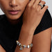 Pandora charm depicting a Disney family theme, featuring beloved characters in a charming and whimsical design.