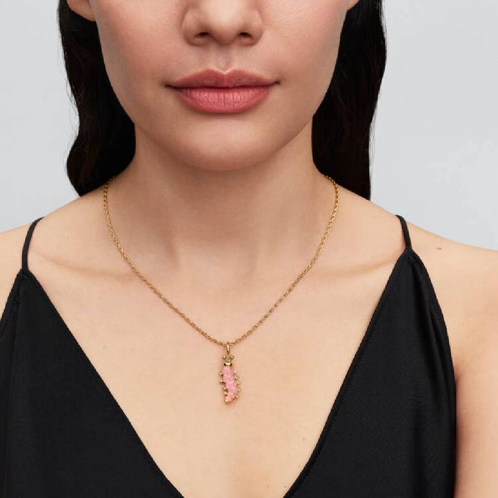 Gold chain showcasing a pink stone charm, beautifully set with diamonds.