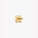 Gold puzzle piece charm on a light background