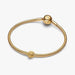 Gold bracelet with a rope design on a white background