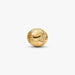 Gold  cylindrical globe  charm on a white background