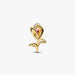 A gold plated rose charm featuring pink stones, symbolizing love and beauty in a stylish accessory.