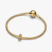 Elegant gold plated rose charm embellished with pink stones, perfect for adding a touch of sophistication.