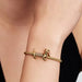 PANDORA Disney Pixar Toy Story Slinky Dog Charm in sterling silver and 14k gold-plated metal for PANDORA Moments bracelets and necklaces.