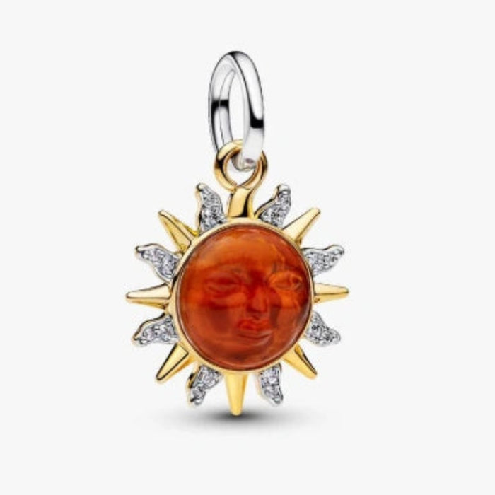 This Pandora Swirling Sun Two-Tone Dangle Charm features a bold swirling sun motif in a striking two-tone finish.
