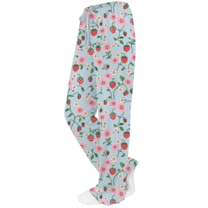 Opportunities Strawberries in the Meadow pants featuring a colorful strawberry and floral meadow print on soft, comfortable fabric with a relaxed fit for lounging or casual wear.