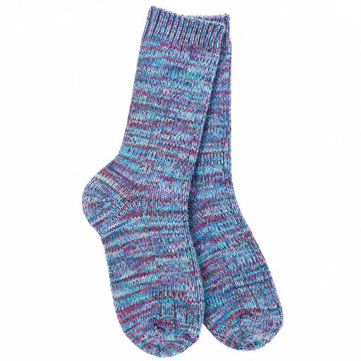 A pair of hand-knit crew socks featuring a marled pattern of blue, purple, and pink yarn, displayed against a solid white background.