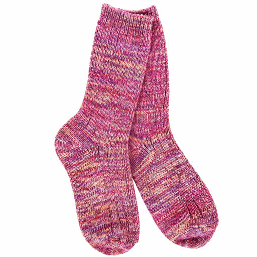 A pair of hand-knit crew socks featuring a variegated marled pattern of pink, purple, and orange yarns, displayed against a solid white background.