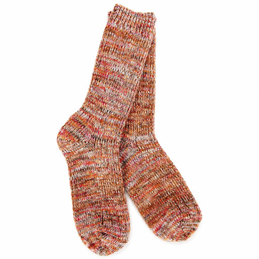 A pair of hand-knit crew socks featuring a marled, heathered pattern of orange, pink, red, and beige yarn, displayed against a solid white background.