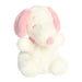 A plush white animal featuring pink ears, positioned on a light-colored surface.