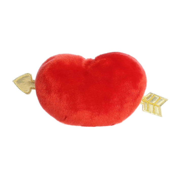 A plush toy shaped like a red heart, complete with an arrow, illustrating a classic symbol of love and romance.