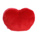 A red heart pillow with printed kisses, illustrating a romantic theme and a cozy atmosphere.