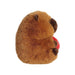 A cuddly stuffed animal clutches a heart with "I love you" written on it, representing heartfelt emotions.