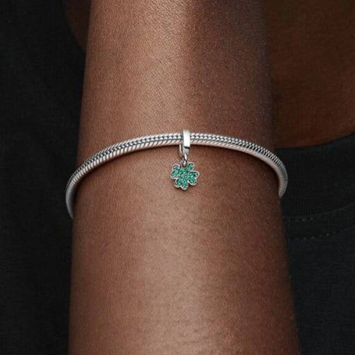 This Pandora Four Leaf Clover Dangle Charm brings a meaningful symbol of luck and positivity to your jewelry collection