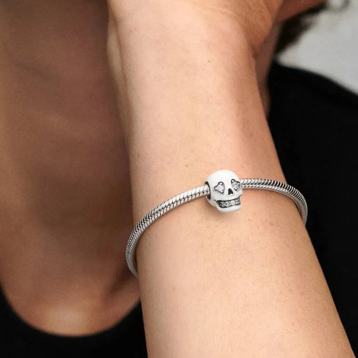 Pandora Glow-in-the-dark Sparkling Skull Charm featuring a detailed skull design with sparkling accents.