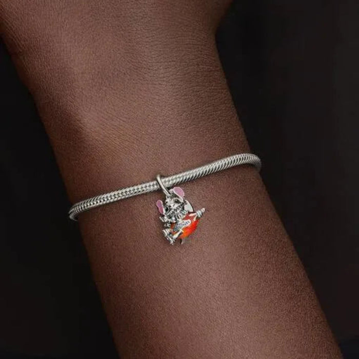 Disney Stitch Rocket Ship Dangle Charm featuring Stitch in a playful space-themed rocket ship design