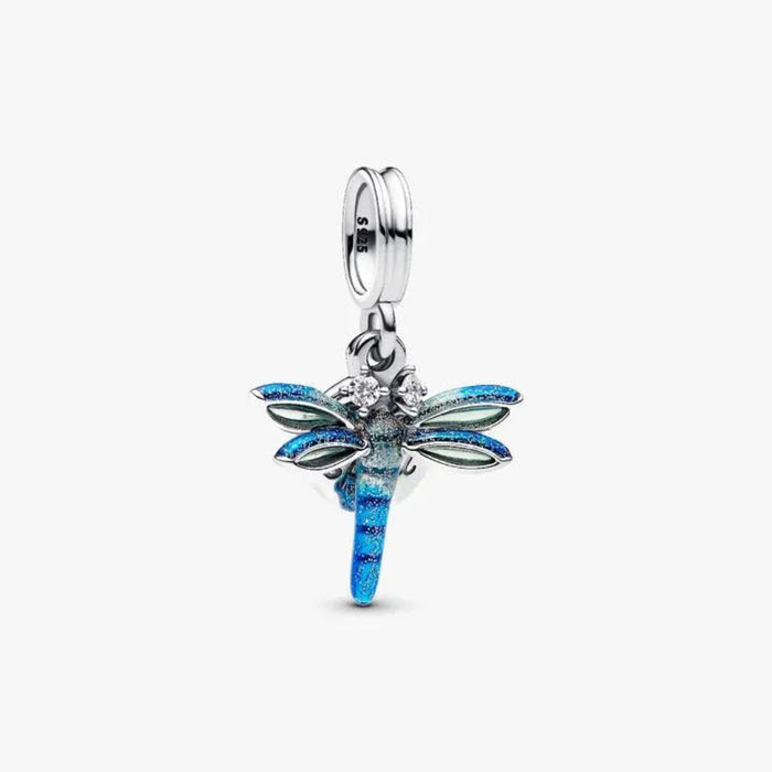 PANDORA Dragonfly Double Dangle Charm in sterling silver with transparent and holographic glitter enamel wings, sparkling stone eyes, and a “Free Spirit” engraved disc for PANDORA Moments bracelets.