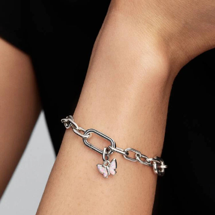 Exquisite Pandora butterfly charm with a white opal, reflecting light and showcasing a refined design.