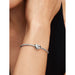 This Pandora April Engravable Clear Stone Heart Charm combines personalized meaning with elegant sparkle.