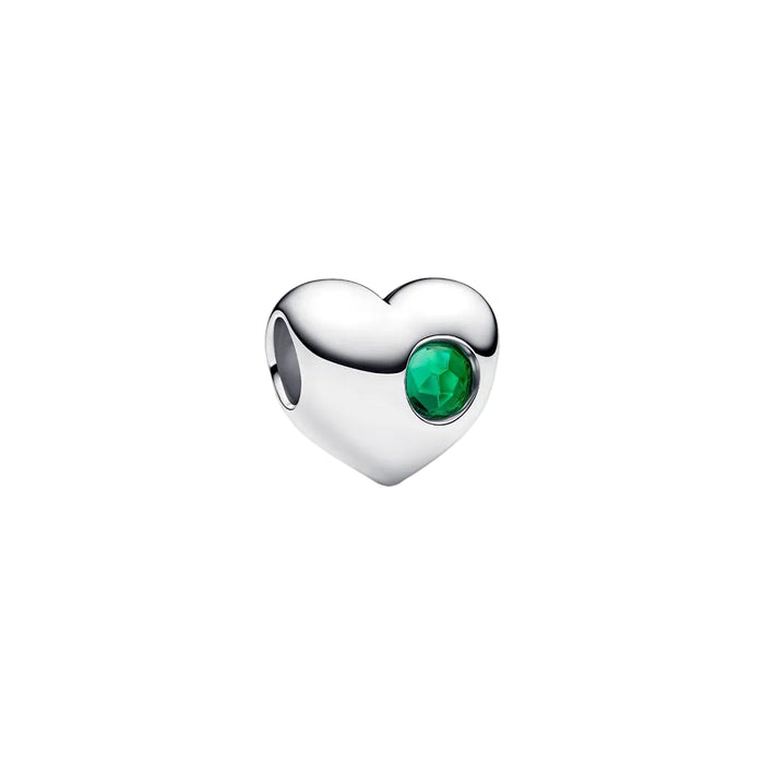 A standalone silver Pandora heart-shaped charm with a faceted green stone accent on a white background.