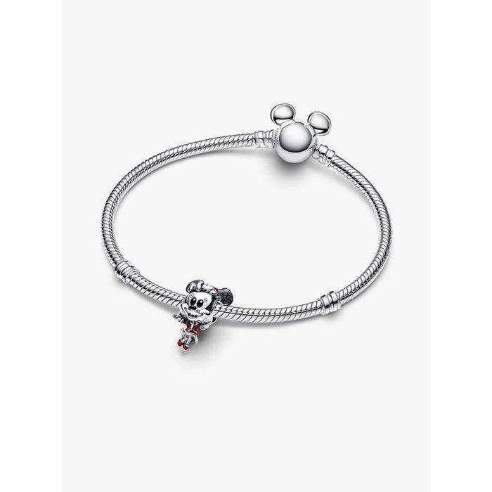 Pandora Moments bracelet styled with the Disney Minnie Mouse Holiday Charm positioned at the center.