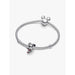 Pandora Moments bracelet styled with the Disney Minnie Mouse Holiday Charm positioned at the center.