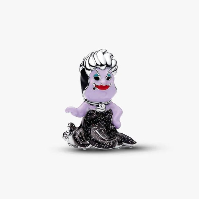 Character Ursula charm with silver  hair and black dress on a white background