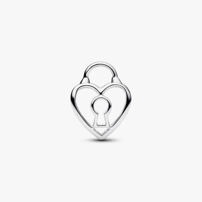Silver heart-shaped charm with a keyhole on a white background