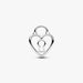 Silver heart-shaped charm with a keyhole on a white background
