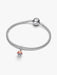 Silver bracelet with a small charm on a white background