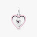 Heart-shaped pendant with pink border and embedded gemstone on a white background