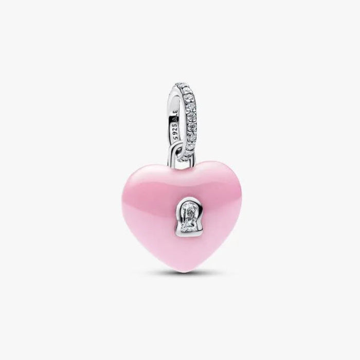Pink heart-shaped charm with silver accents on a white background