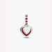 Heart-shaped charm with red accents on a light background