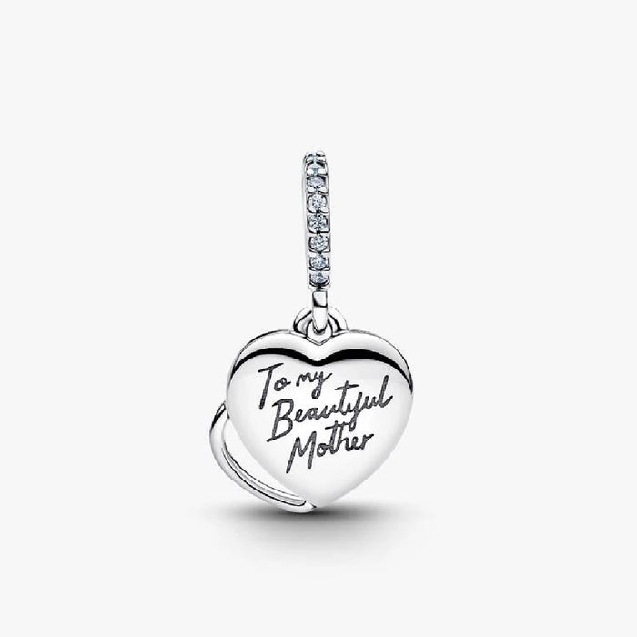 Heart-shaped Pandora charm featuring pink opal stones, highlighting a beautiful and stylish accessory.