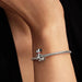 A black and white dog charm with a distinctive and artistic design.