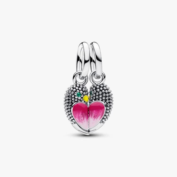 Silver bird-shaped charm on a light background